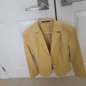 Boss yellow jacket with belt detail at back